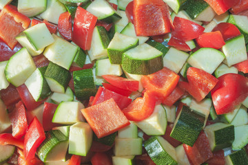 Diced red pepper and zucchini