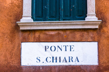 Typical road sign in venice street, Italy