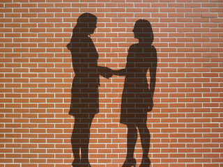 women handshake © Jonathan Stutz