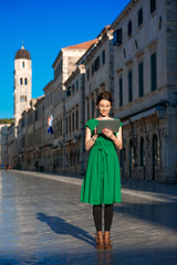 Fototapeta na wymiar Woman traveling in Dubrovnik city