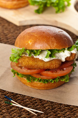 Breaded Fish burger. Selective focus.