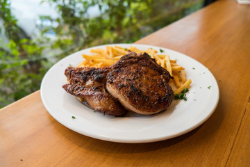 pork chop steak with French Fries