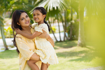Hugging mother and daughter