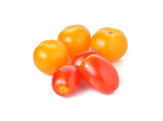 cherry tomato and yellow plum tomato on white background