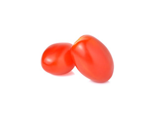 red cherry tomato on white background