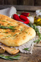 Italian focaccia bread with rosemary and garlic