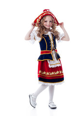 Charming little girl posing in rustic dress