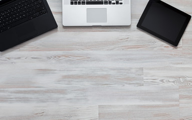 Wooden desk with many electronic devises