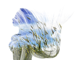 Double exposure of happy girl dancing and wheat field