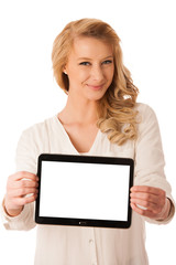 Beautiful young caucasian woman holding a tablet in her hand iso