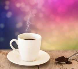 Black Coffee in white Cup on Bokeh background