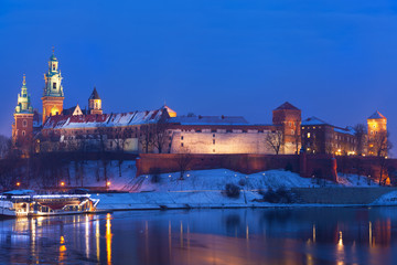 Wawel castle in night illumination in the winter. Krakow, Poland