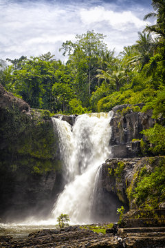 picturesque Tegenungan falls in tropics on the island of Bali