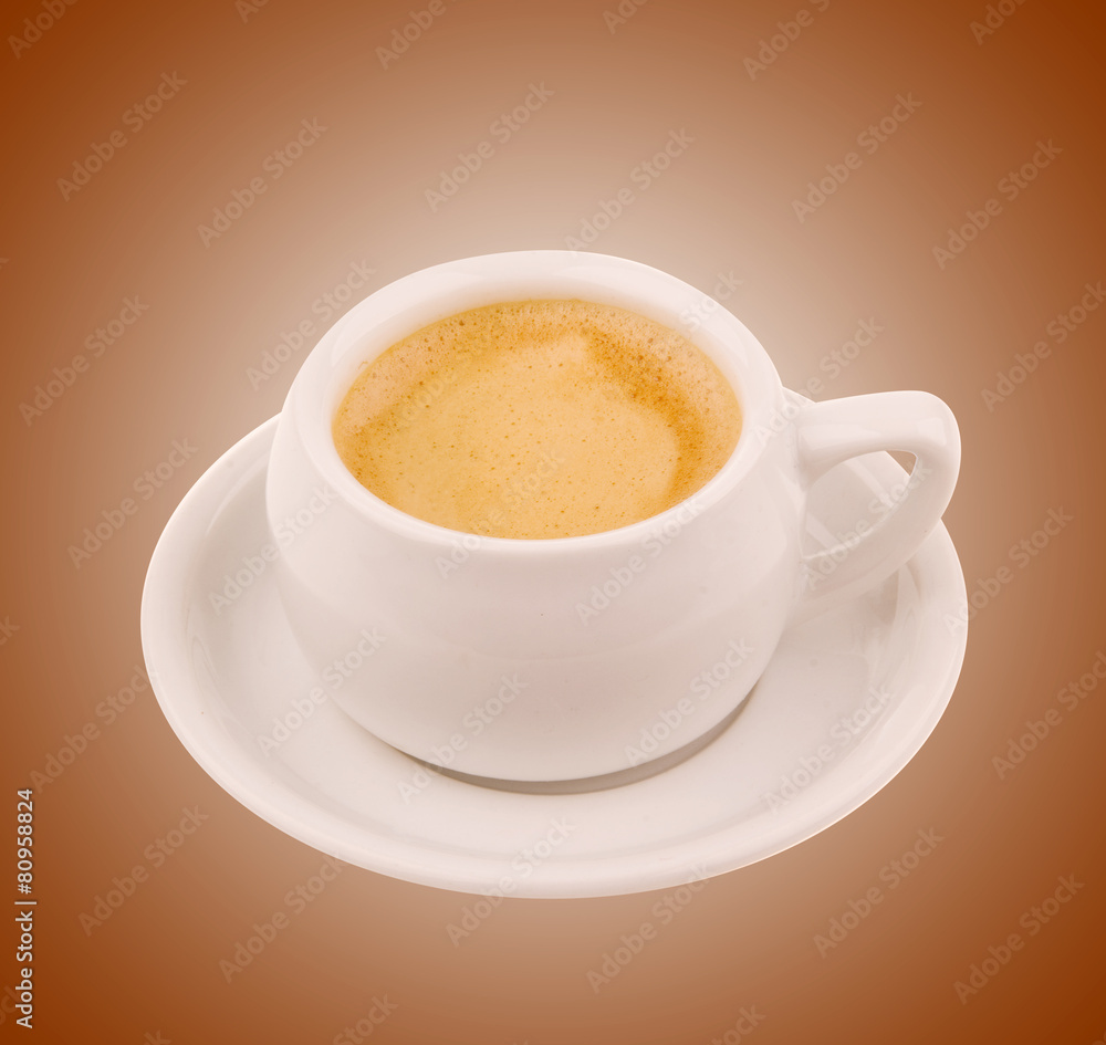 Wall mural Coffee cup of espresso on brown background