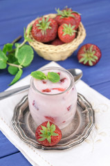 Strawberry yogurt  with fresh fruits and mint leaves