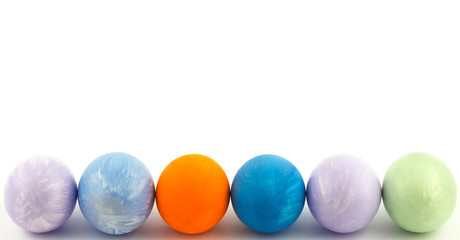  Row colorful Easter painted eggs isolated on white background