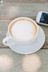 Coffee cup on wood - Vintage effect style pictures