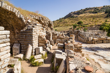 Fototapeta na wymiar View of the ruins on the ancient street in Ephesus