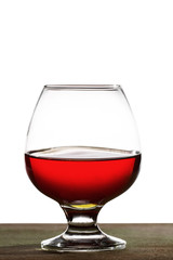 Whiskey or brandy on a wooden table