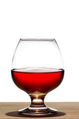 Whiskey or brandy on a wooden table