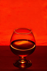 Whiskey or brandy on a wooden table