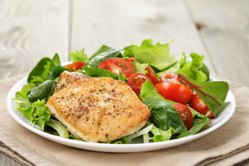 Roasted chicken with vegetable salad and herbs