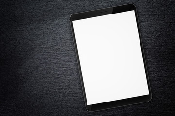 generic tablet pc on top of slate board