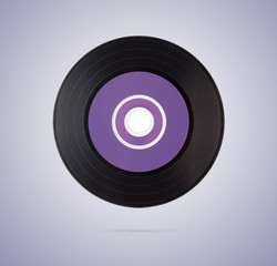 Black vinyl disk on gradient background