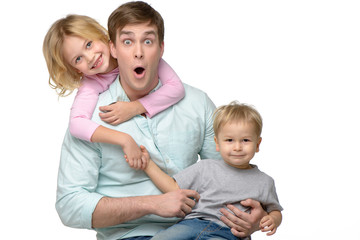 Young father with his two kids having fun