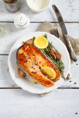 Salmon with lemon on a plate