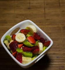 Bowl of fruit - healthy fitness meal concept