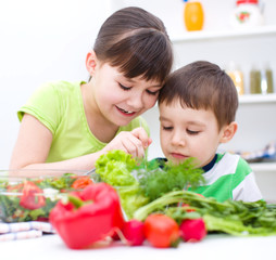 Children eating salad