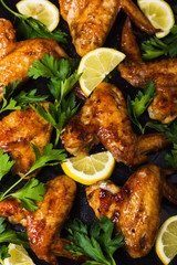 Roasted chicken wings with parsley and lemon