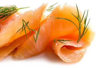 smoked salmon in slices with dill garnish