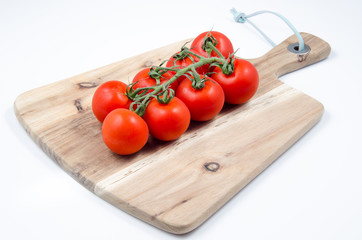 Tomatoes on wooden table