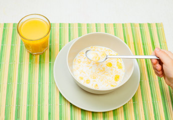 POV child having cereals for breakfast