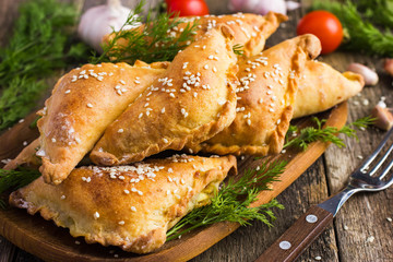 Fresh baked  pasties filled with meat and vegetable