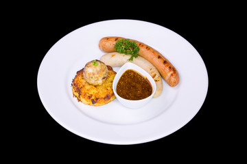 Grilled assorted sausages with spices sauce