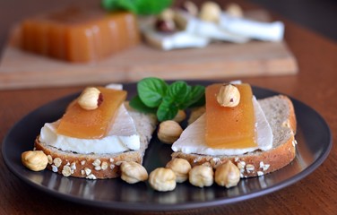 Quince And Fresh White Cheese On Bread Toast