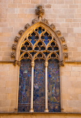 Fototapeta na wymiar Stained glass window of one of Catholic churches in Barcelona