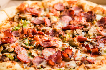 Homemade pepperoni pizza in carton box
