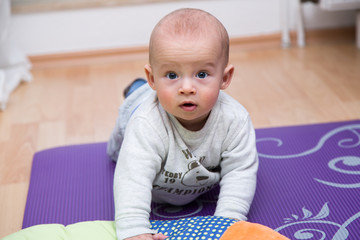 Portrait of a cheerful newborn .