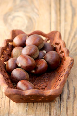 Chestnuts in a wooden bowl