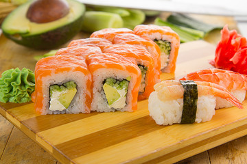 Japanese tasty sushi set on a wooden plate