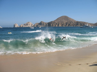 Surfing the waves in Cabo San Lucas Mexico