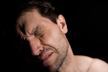 Obraz premium Emotional Man In Shadow