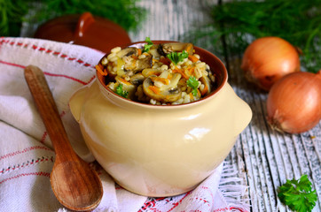 Barley with fried mushrooms and vegetable.