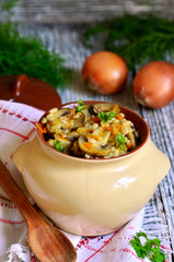 Barley with fried mushrooms and vegetable.