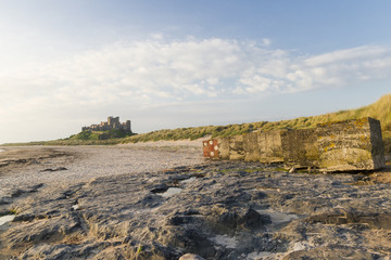 Bamburgh Castle and coastal defences, Northumberland. England.