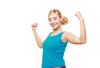 Fitness woman showing fresh energy flexing biceps muscles